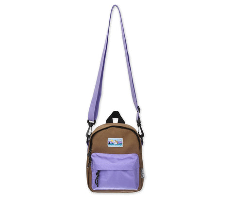 3. Studio shot of Moomin by NordicBuddies Moomintroll Adventure Cross Body Bag in brown and lilac, showing full length of adjustable strap