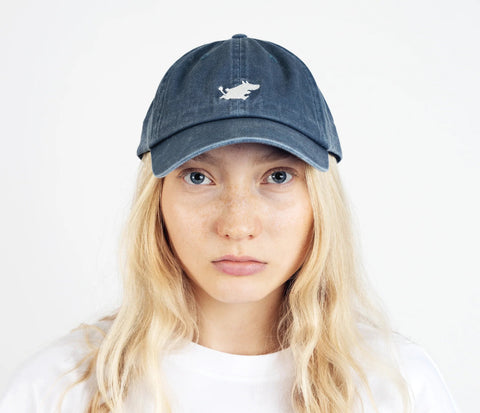 4. Front view of unisex blue Moomintroll washed denim cap on female model