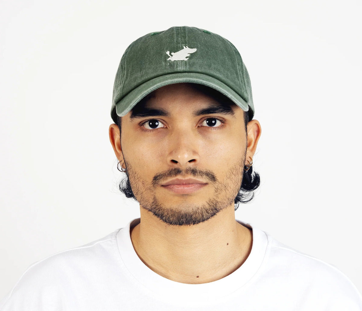 2. Man wearing Moomintroll washed denim cap in green by NordicBuddies, front view