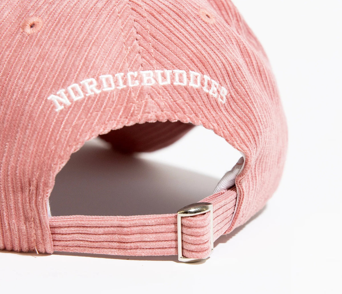 6. Close-up of adjustable strap on pink Moomintroll corduroy cap with NordicBuddies branding