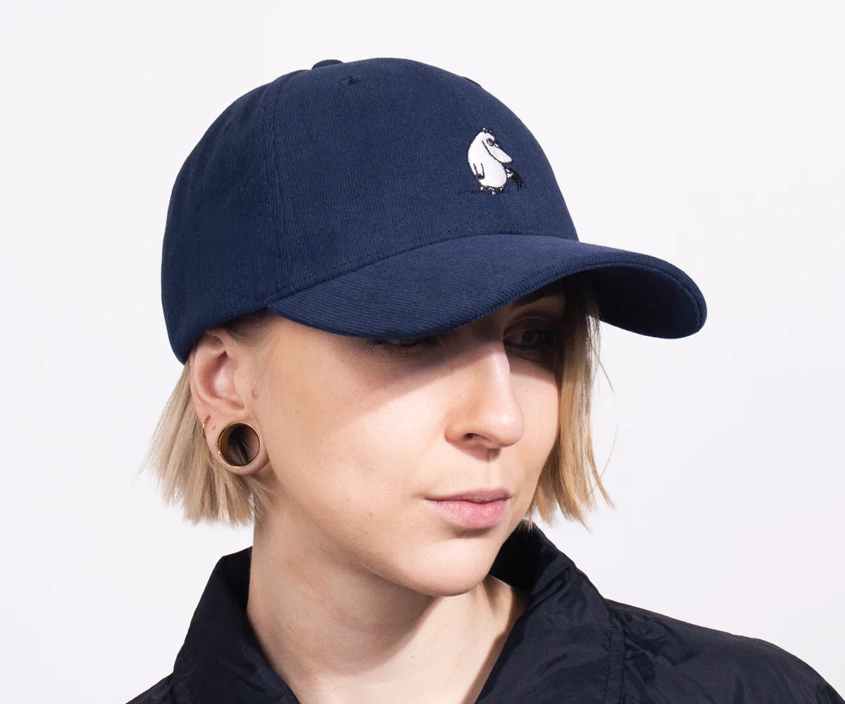 4. Woman wearing navy Moominpappa corduroy cap by Moomin, shown from front