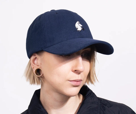 4. Woman wearing navy Moominpappa corduroy cap by Moomin, shown from front