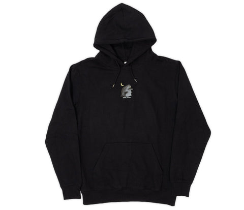 3. Studio image of unisex black Moomin hoodie with minimalistic character detail on chest