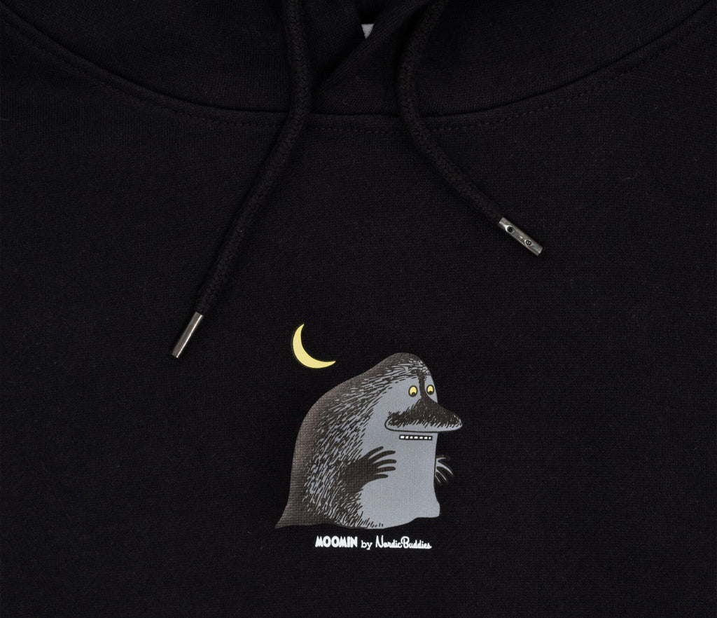 4. Close-up of Moomin character detail on black hoodie, featuring moon and Groke design