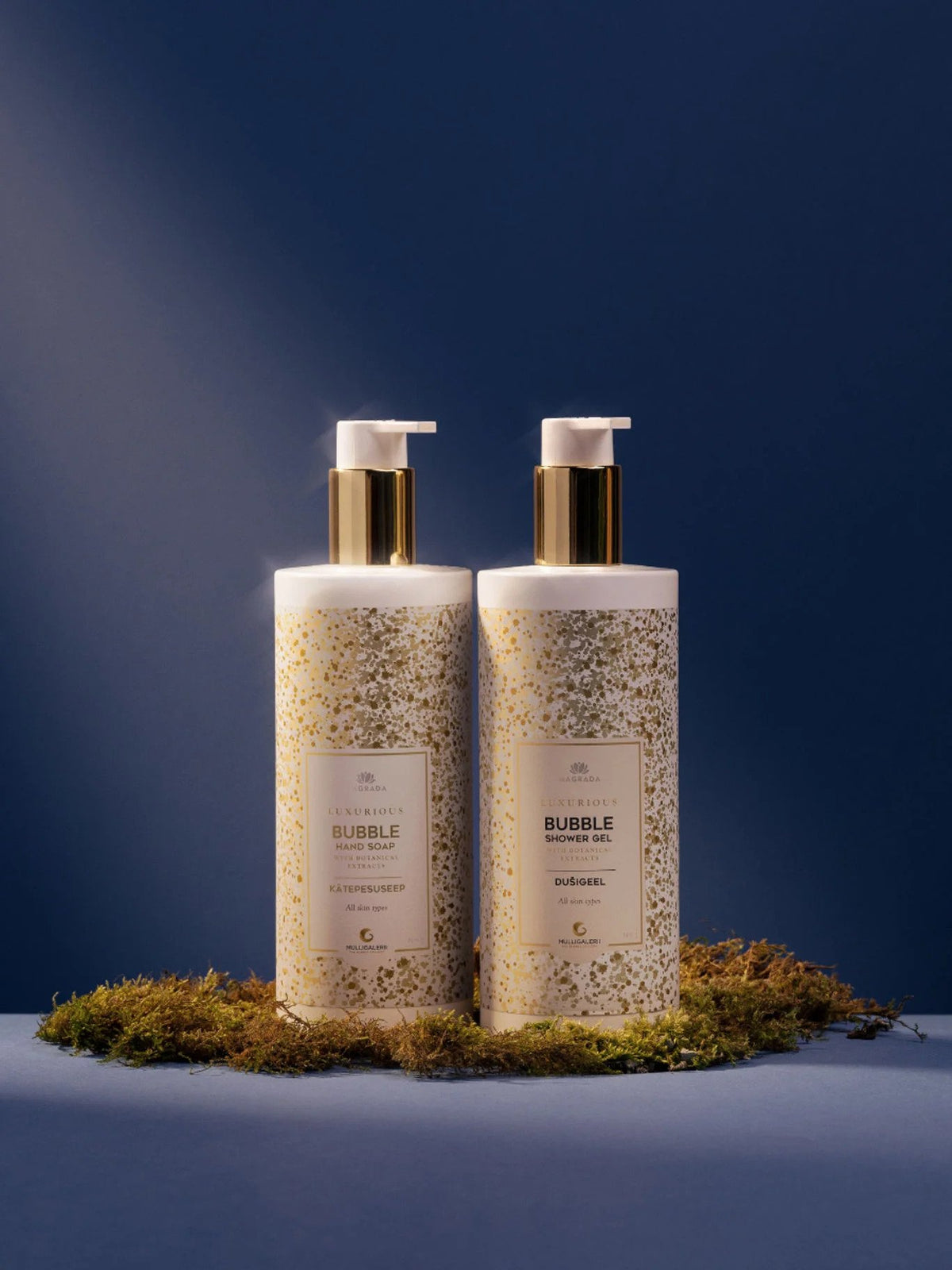 3. Studio shot of Magrada Organic Cosmetics Bubble Shower Gel bottles on moss, emphasizing natural ingredients and premium packaging