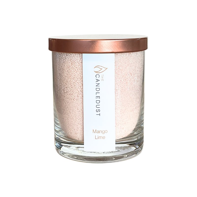 4. Candledust Mango Lime powdered candle in a glass jar with rose gold lid, studio shot