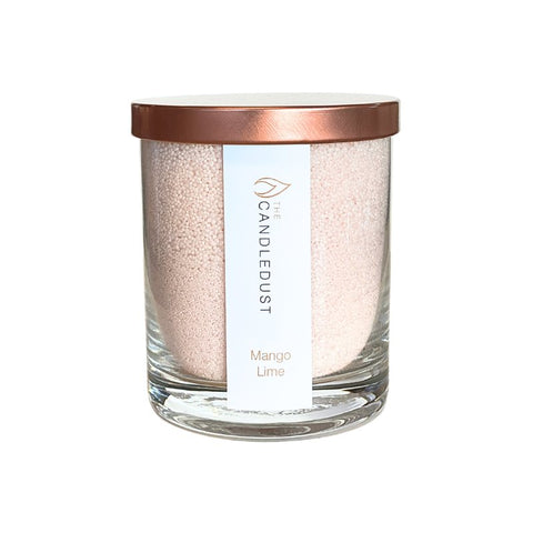 4. Candledust Mango Lime powdered candle in a glass jar with rose gold lid, studio shot
