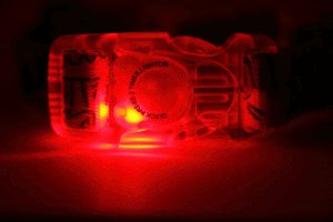 3. Close-up of red LED light on transparent buckle of Matteo Boho dog collar