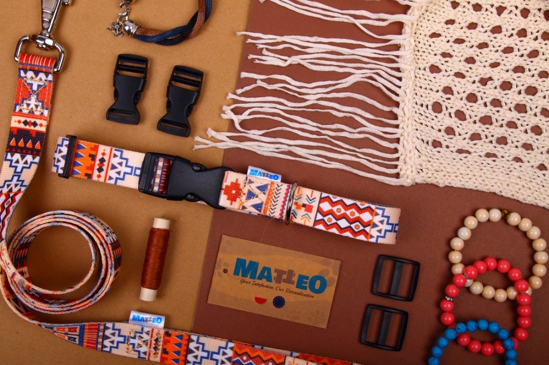 10. Flat lay of Matteo Boho Collection dog collar and accessories with colorful geometric pattern