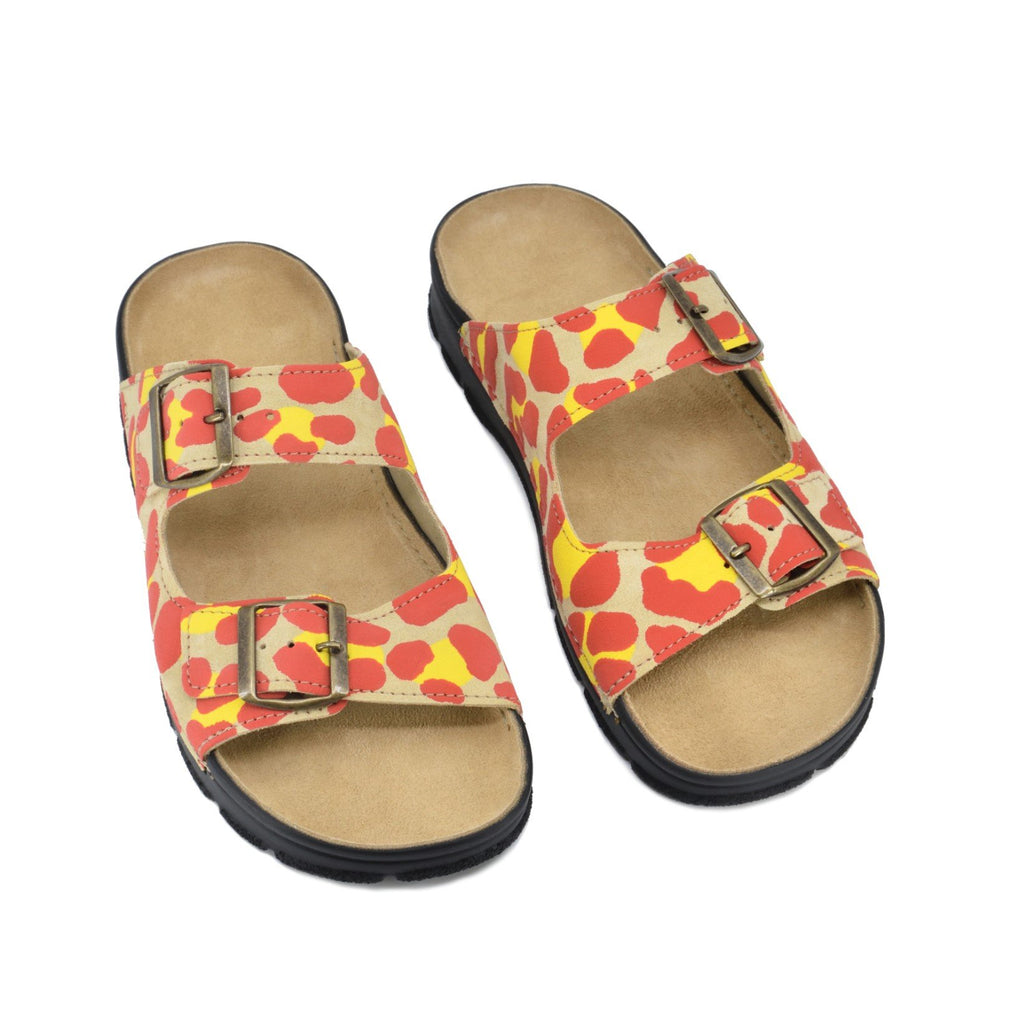 2. Pair of Omaking Meeliku Sandals in red and yellow, featuring adjustable buckle straps and supportive insole, studio shot
