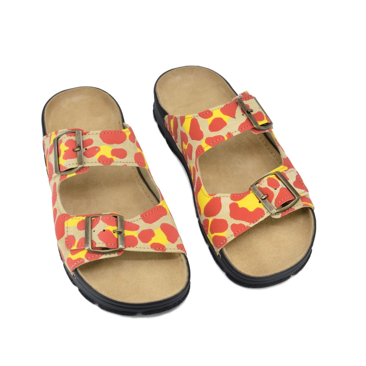 2. Pair of Omaking Meeliku Sandals in red and yellow, featuring adjustable buckle straps and supportive insole, studio shot