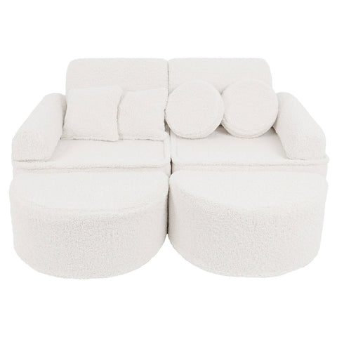 1. Modular children's sofa in bearly cream color with round and square cushions, shown in a complete setup