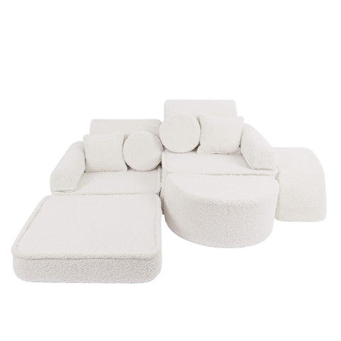 2. Modular children's sofa in bearly cream color with various cushion shapes, arranged in a creative layout