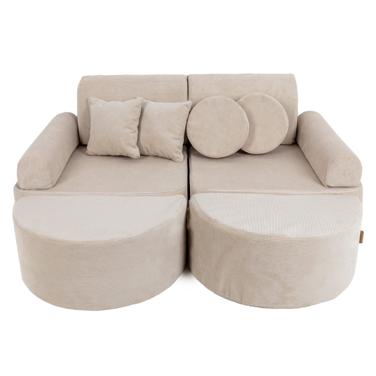 1. Children's modular sofa in ecru slimcord fabric with multiple cushions, shown in a studio setting