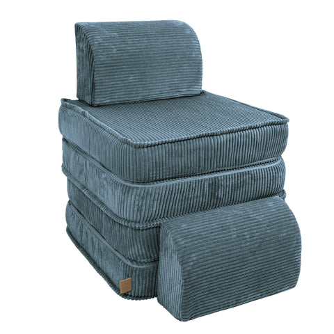 4. Stacked configuration of children's modular sofa in aesthetic turquoise, showcasing compact storage option in a studio setting.