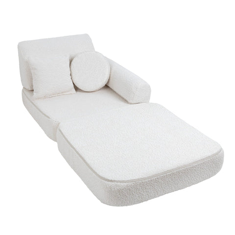2. Medium modular children's sofa in white boucle fabric configured as a chaise lounge with one round and one square cushion
