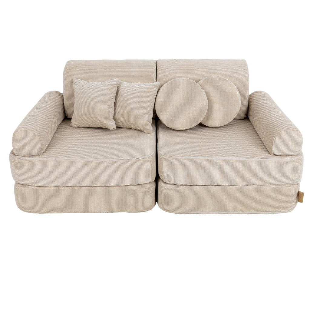 1. Medium modular children's sofa in ecru slimcord fabric with two square and two round cushions, shown in a compact configuration