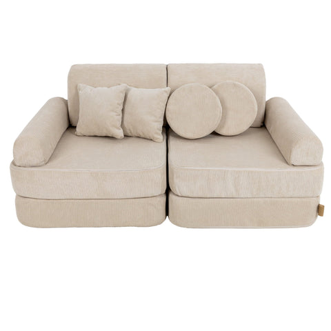 1. Medium modular children's sofa in ecru slimcord fabric with two square and two round cushions, shown in a compact configuration