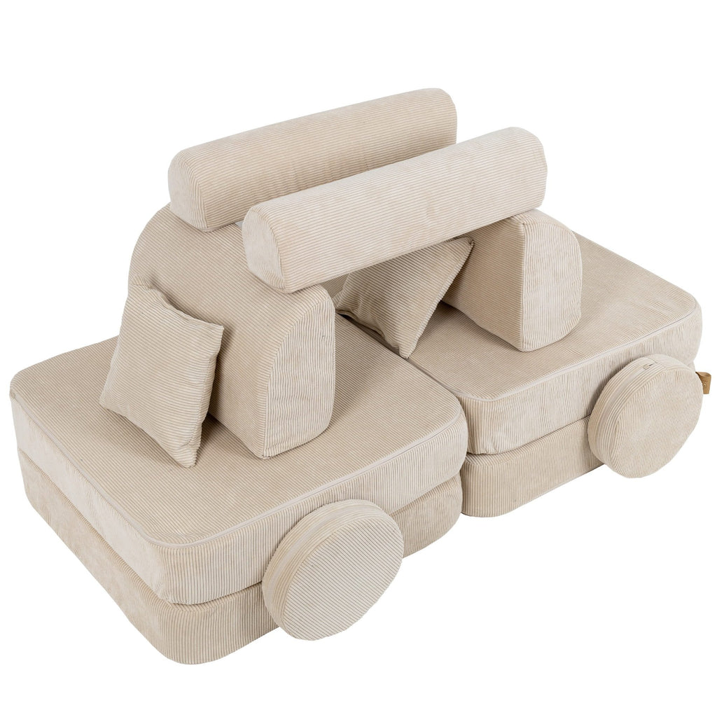 3. Medium modular children's sofa in ecru slimcord fabric arranged in a creative structure with cushions
