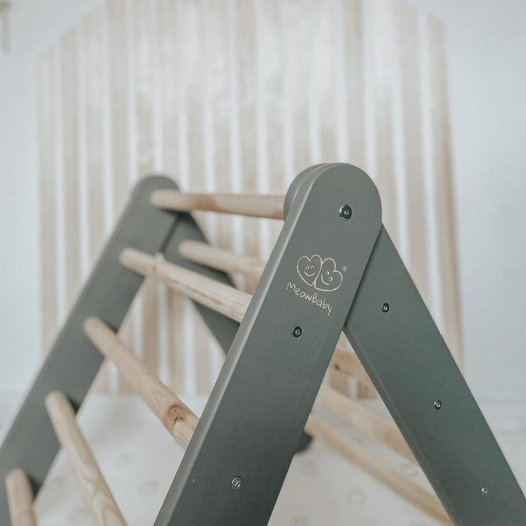 1. Grey MeowBaby ladder in room with wooden rungs, highlighting indoor play setup and design