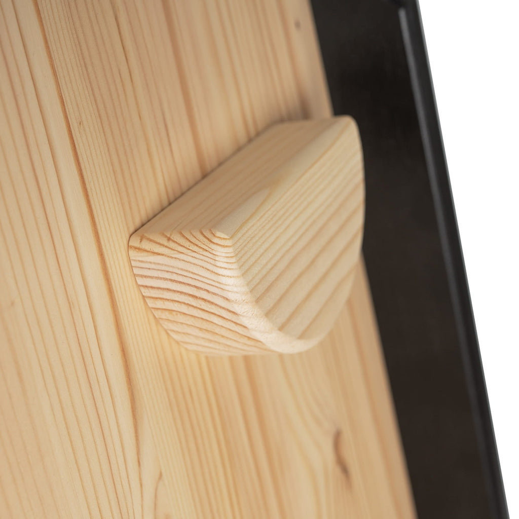 5. Close-up of wooden grip hold on climbing wall board, highlighting texture and construction