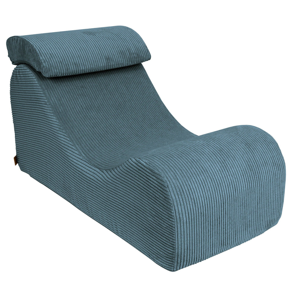 2. Turquoise wave lounger with distinctive S shape and ribbed texture, displayed in a studio