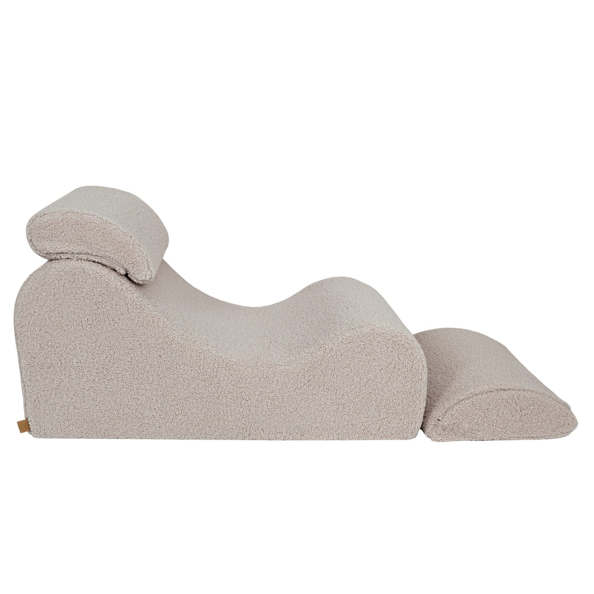 3. Side view of light grey Wave Lounger with extended footrest, highlighting S-shaped design