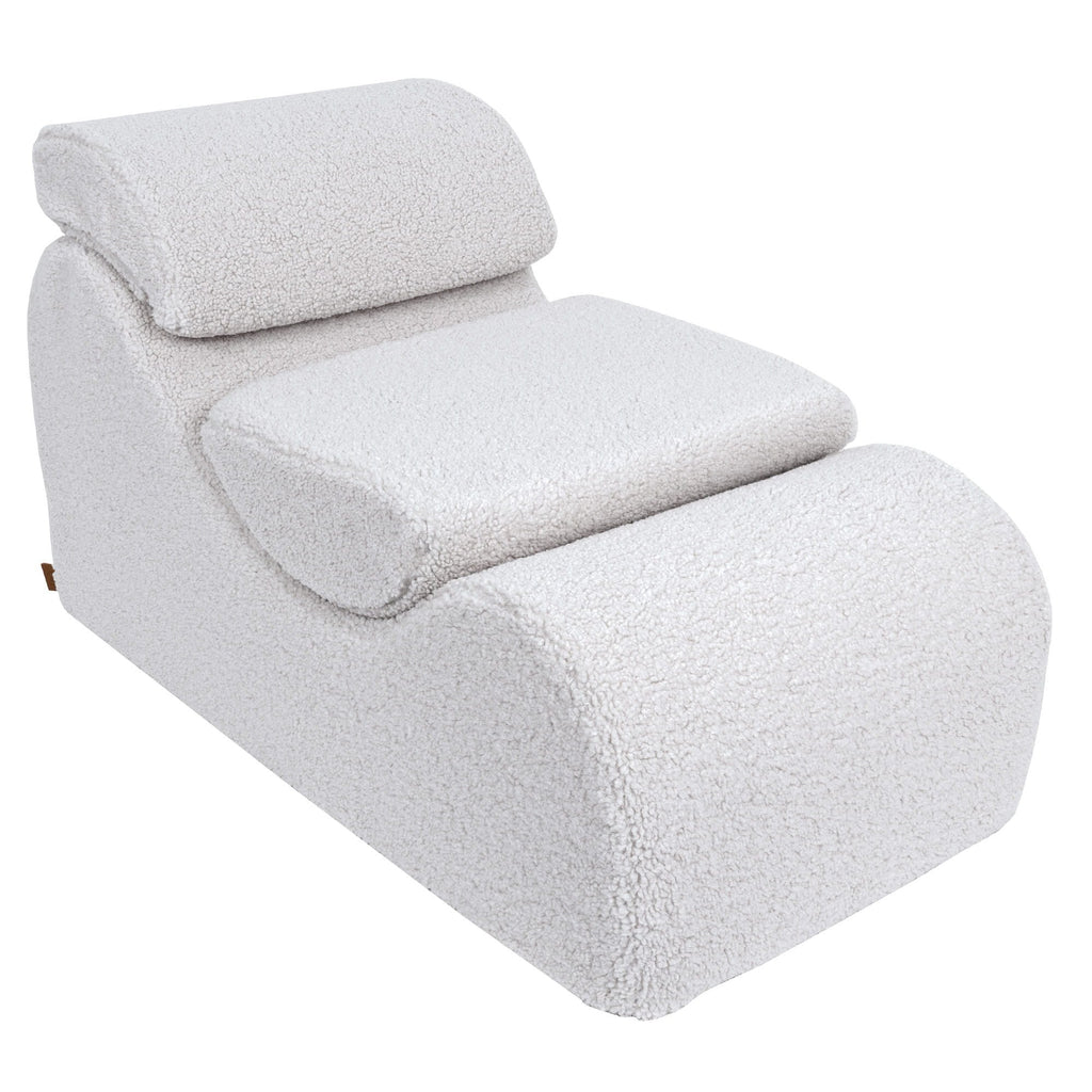 1. White Wave Lounger with ergonomic design and removable headrest, shown in a studio setting
