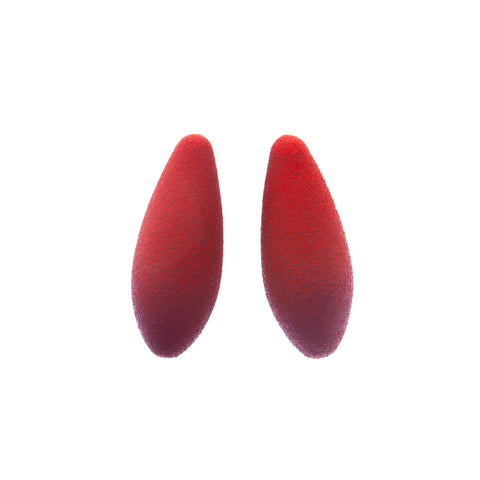 2. Pair of Tanel Veenre Mini Raspberries Earrings in red with velvety cosmic dust coating on white background