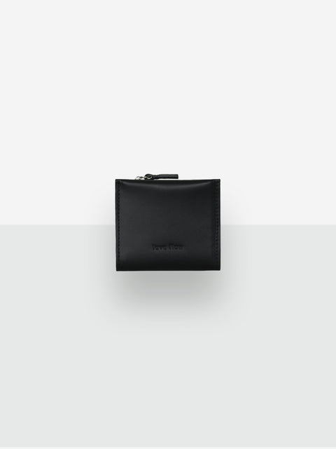 5. Studio image of Lava flow Classic Leather Wallet MINI TAAL in black, featuring minimalist design and brand logo