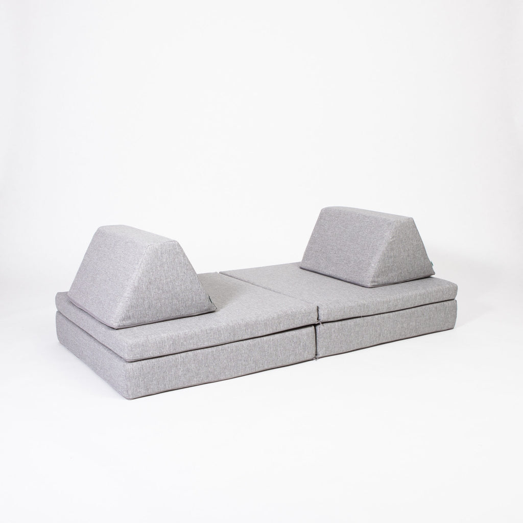 2. Grey Monboxy activity play mattress set with two trapezoidal pillows on white background