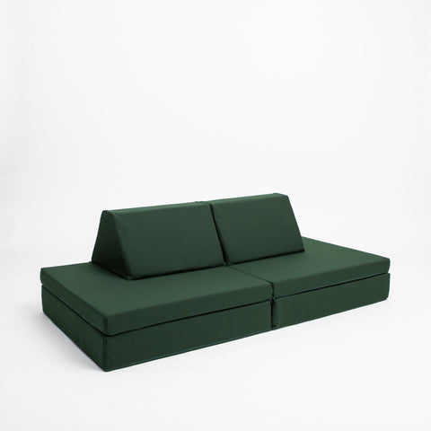 2. Monboxy deep green play mattress set arranged as a sofa on a white background