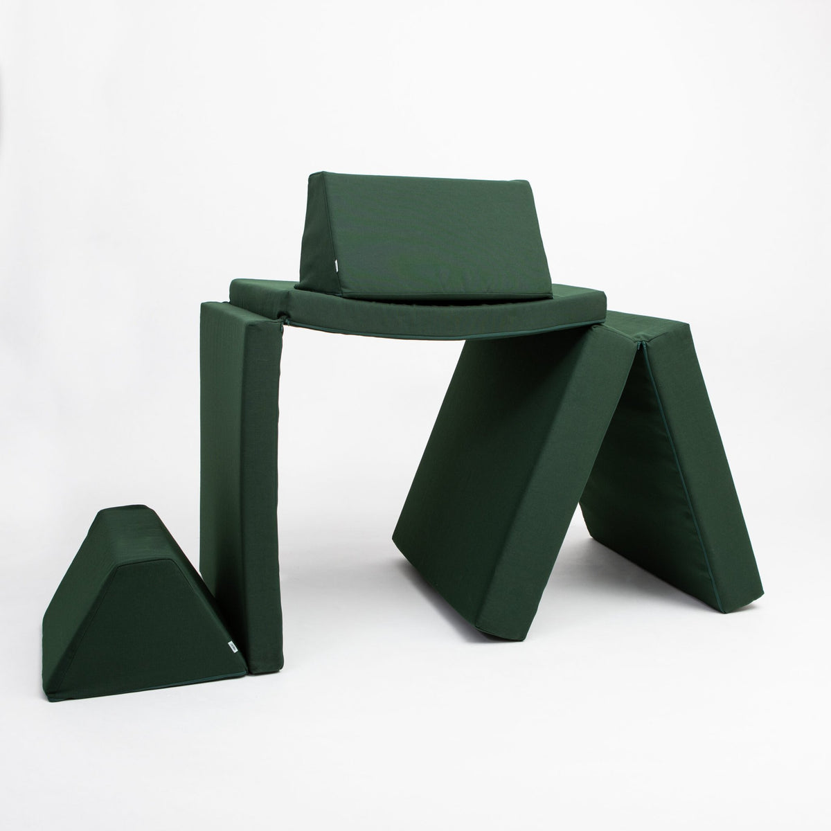 4. Monboxy deep green play mattress set in a creative arch structure