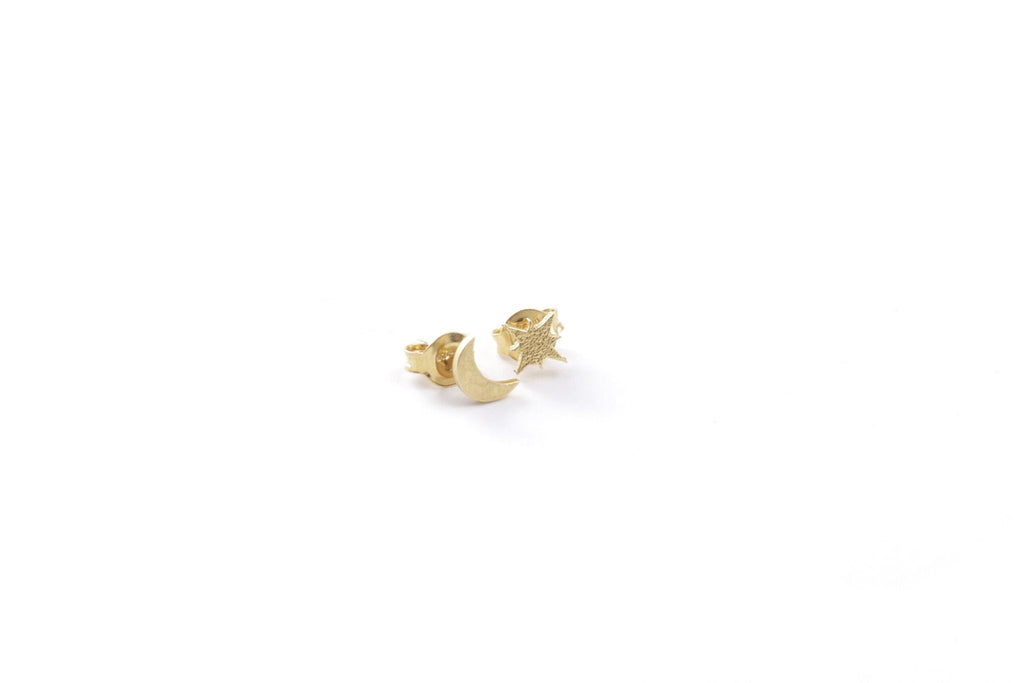 1. Gold plated silver moon and star stud earrings by New Vintage by Kriss, shown in studio setting