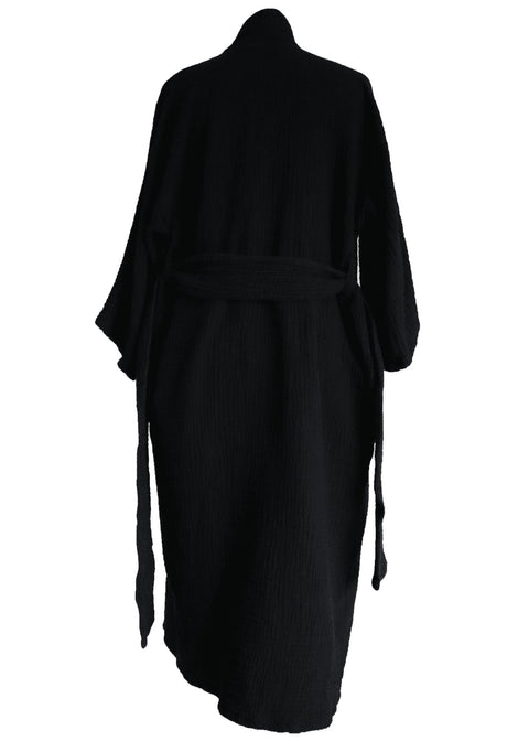 1. Unisex black ÜRP robe worn by model, showcasing universal fit and cozy texture