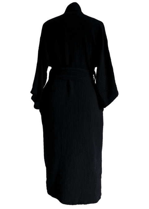 3. Side view of black ÜRP robe in studio, highlighting soft cotton material