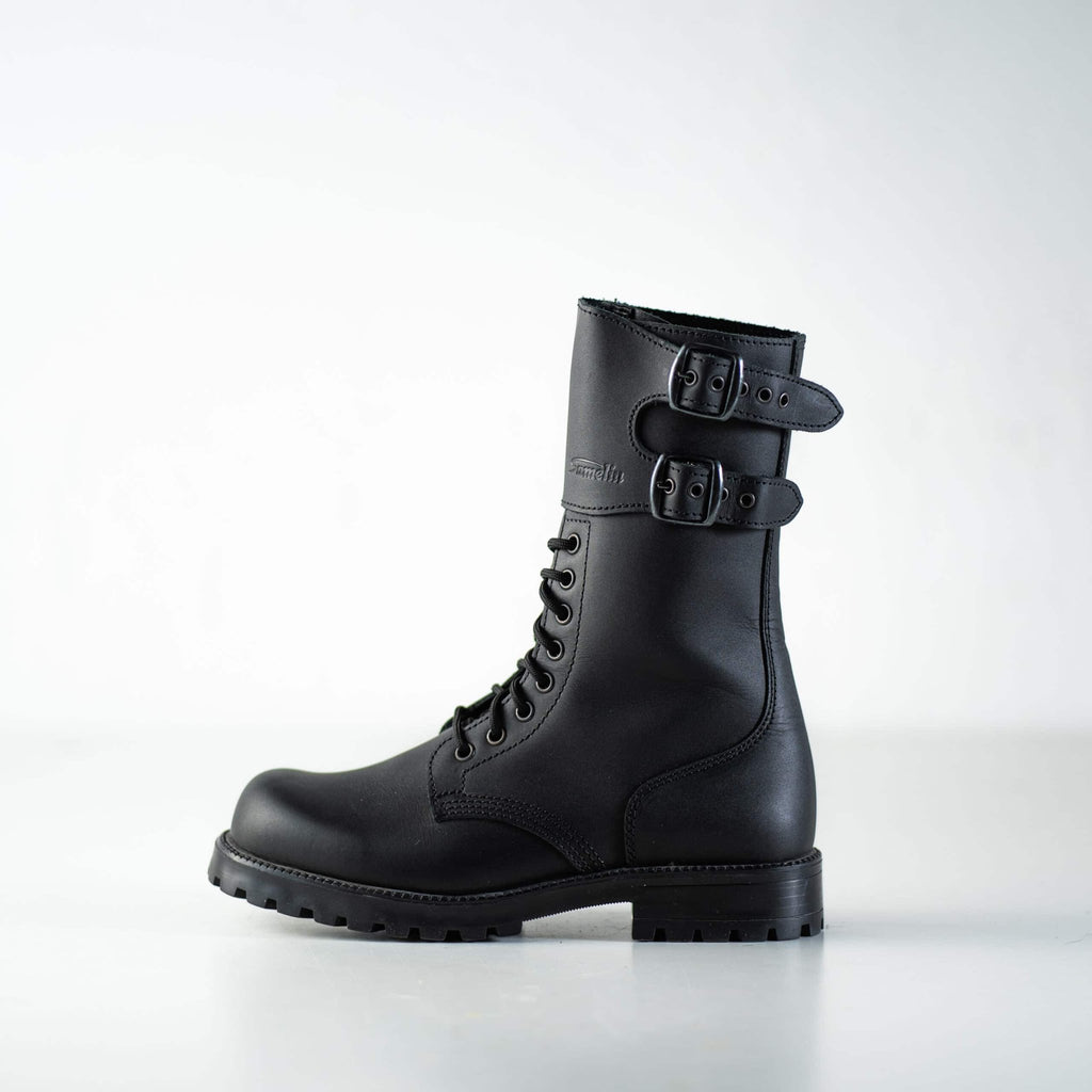 3. Unisex black Tarkovsky boots by Samelin displayed in studio with focus on sole and side buckles
