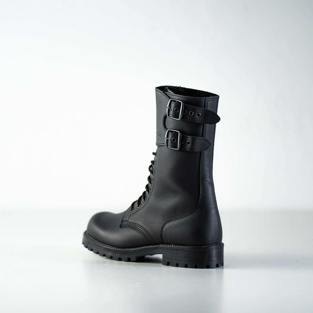 4. Studio shot of unisex black Tarkovsky boots by Samelin, side view showing lace-up and buckle details