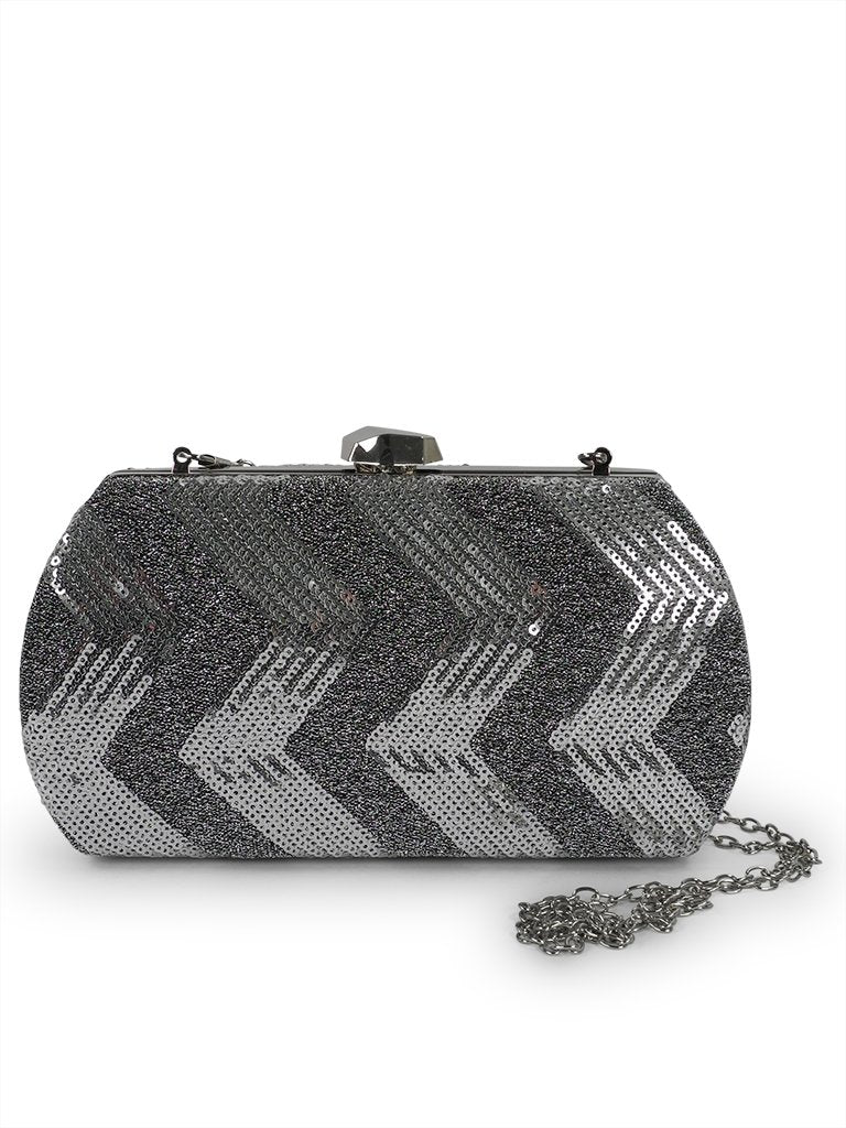 1. Nabo Evening Bag NK 2231 in silver with shiny sequin pattern and removable chain strap, shown in studio