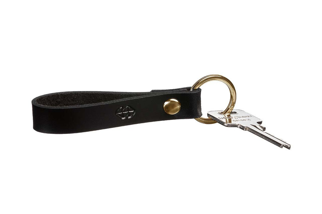 2. Black leather keychain by Stella Soomlais with keys attached, displayed on a white background
