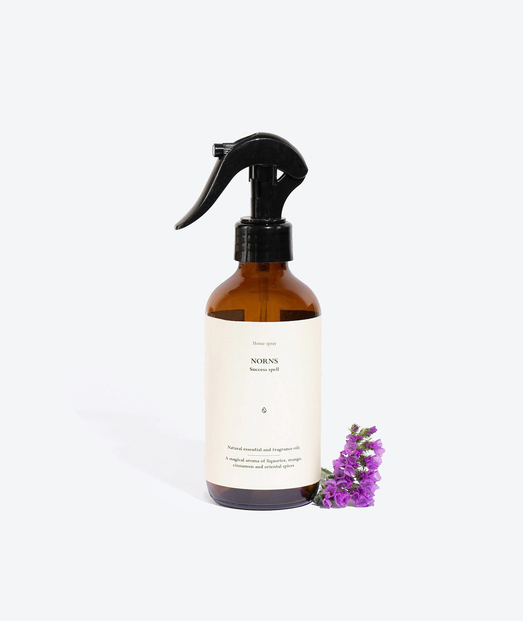 1. Perfumed Home Spray NORNS by Smells Like Spells in amber bottle with lavender, showcasing natural fragrance blend