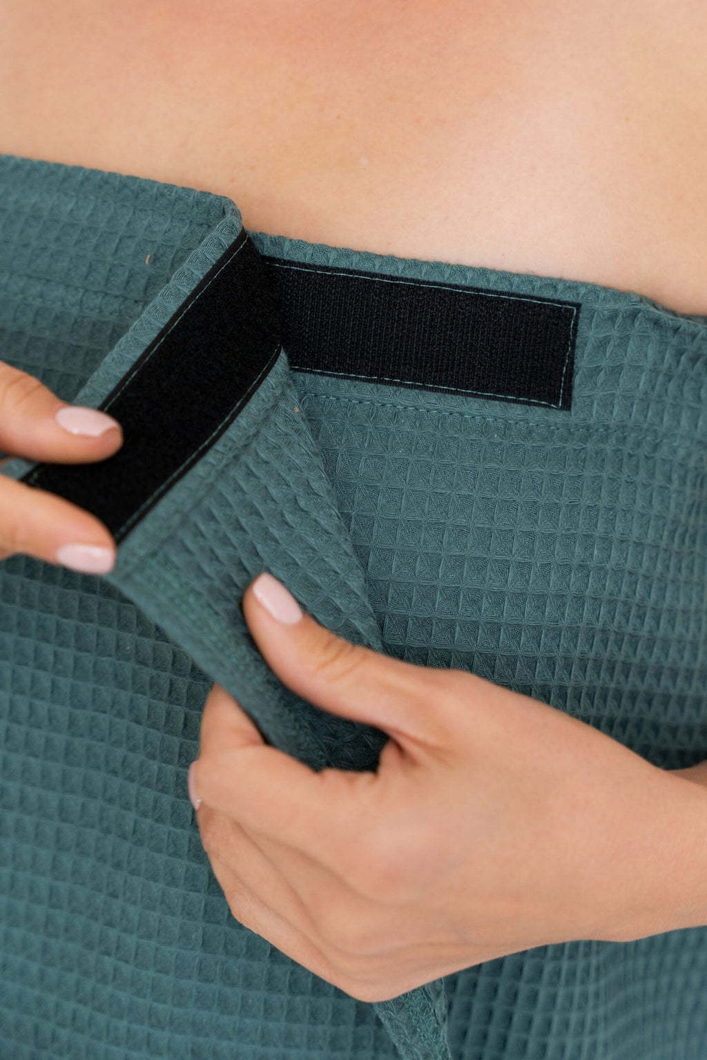 3. Close-up of petrol-colored spa wrap towel showing Velcro fastening detail