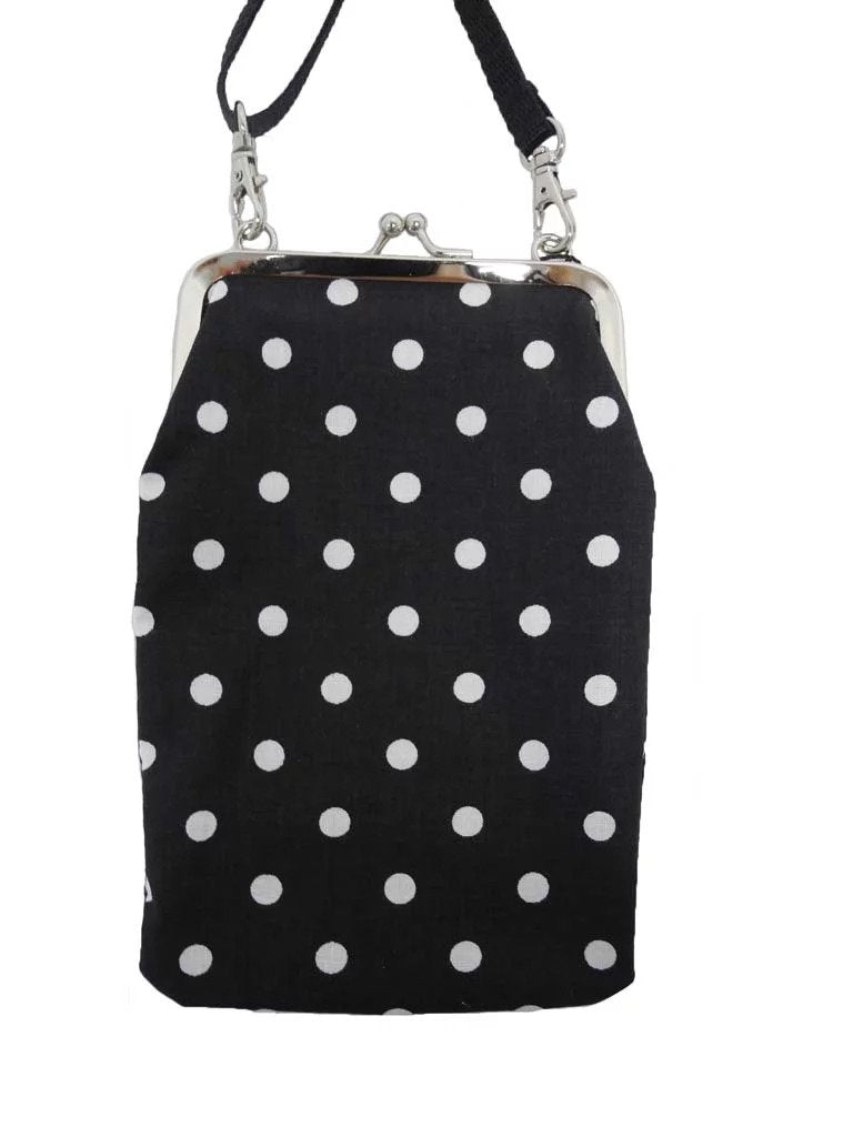 4. Nabo Phone Bag K556 with white polka dot pattern on black fabric, adjustable strap, studio shot
