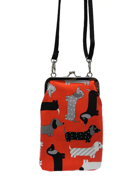 5. Nabo Phone Bag K556 featuring dachshund dog pattern on orange fabric, adjustable strap, studio shot