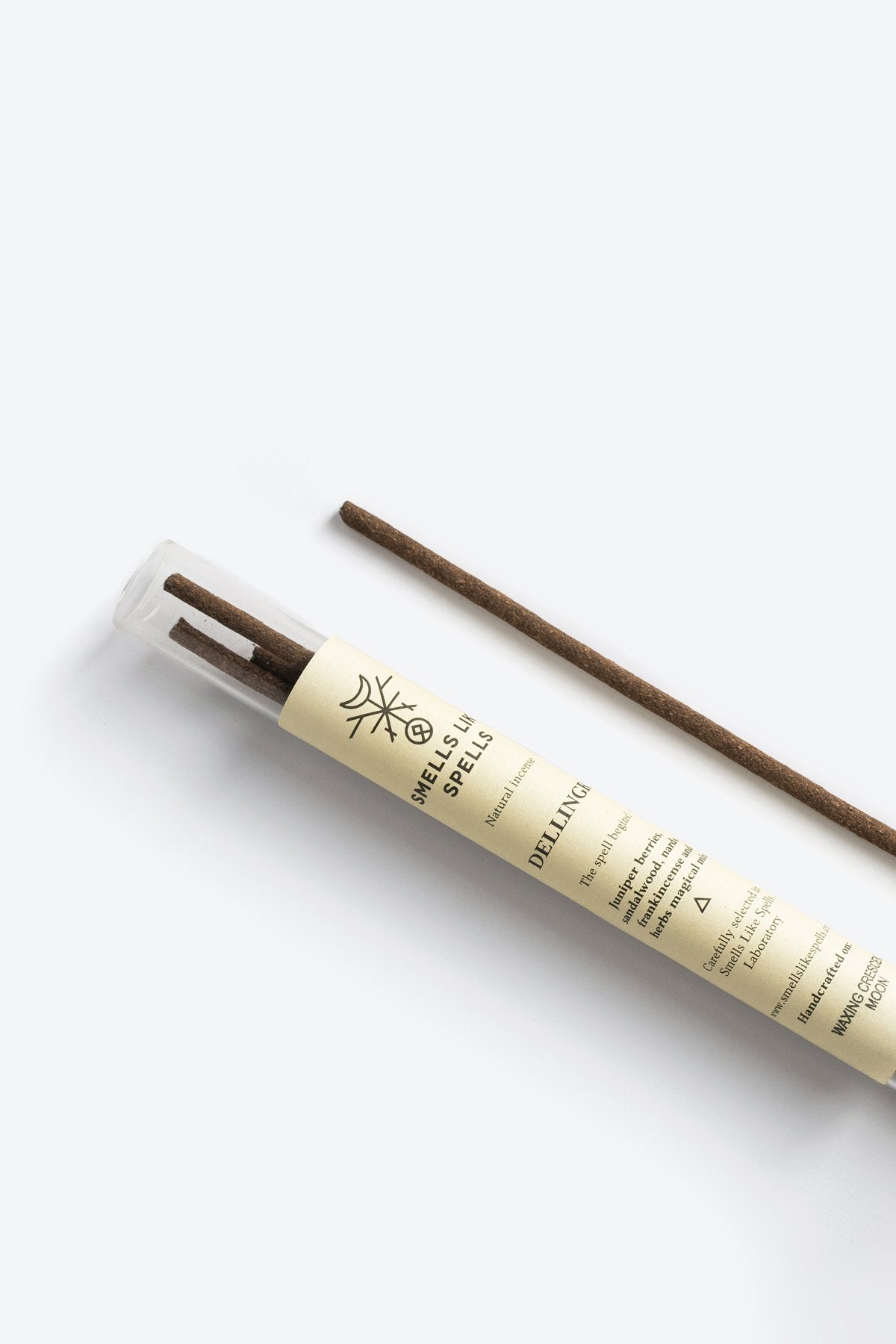 1. Smells Like Spells Natural Incense DELLINGR in tube with incense stick, showcasing eco-friendly packaging