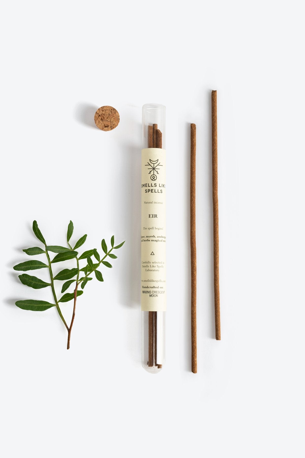 1. Smells Like Spells Natural Incense EIR with juniper, myrrh, and ambergris, shown with cork and greenery in a flat lay