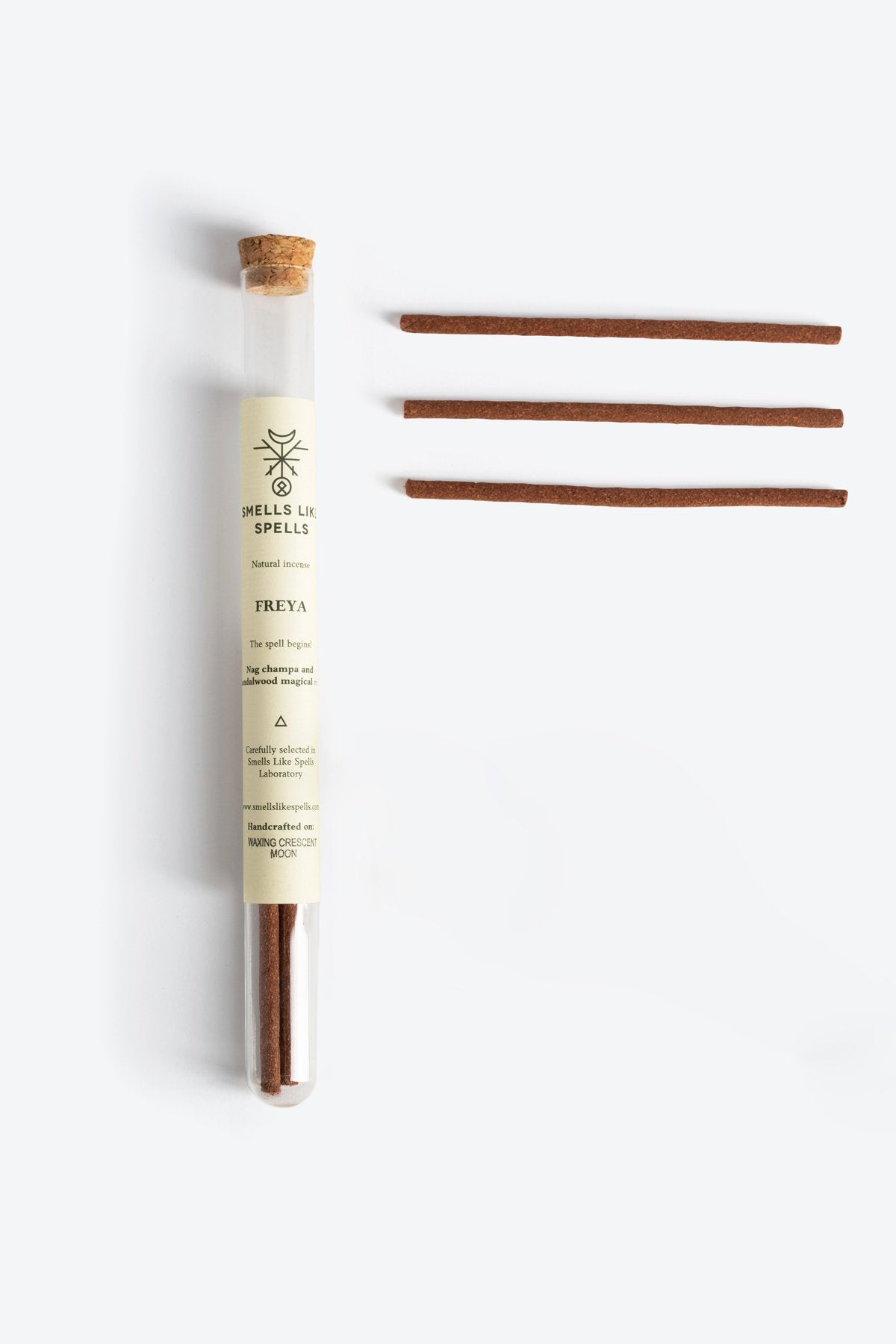 1. Smells Like Spells Natural Incense FREYA in glass tube with three incense sticks, studio setting