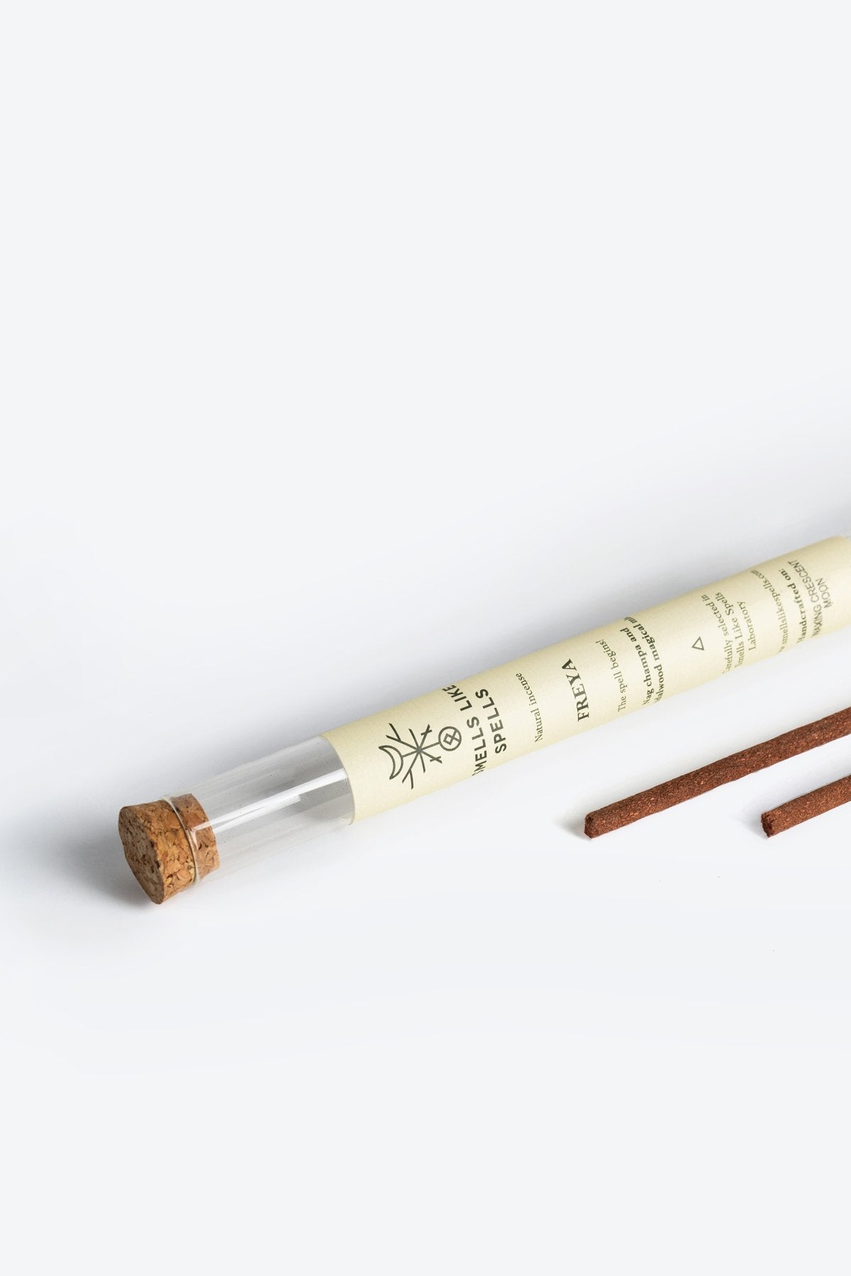 3. Close-up of Smells Like Spells Natural Incense FREYA in glass tube with cork lid, studio setting