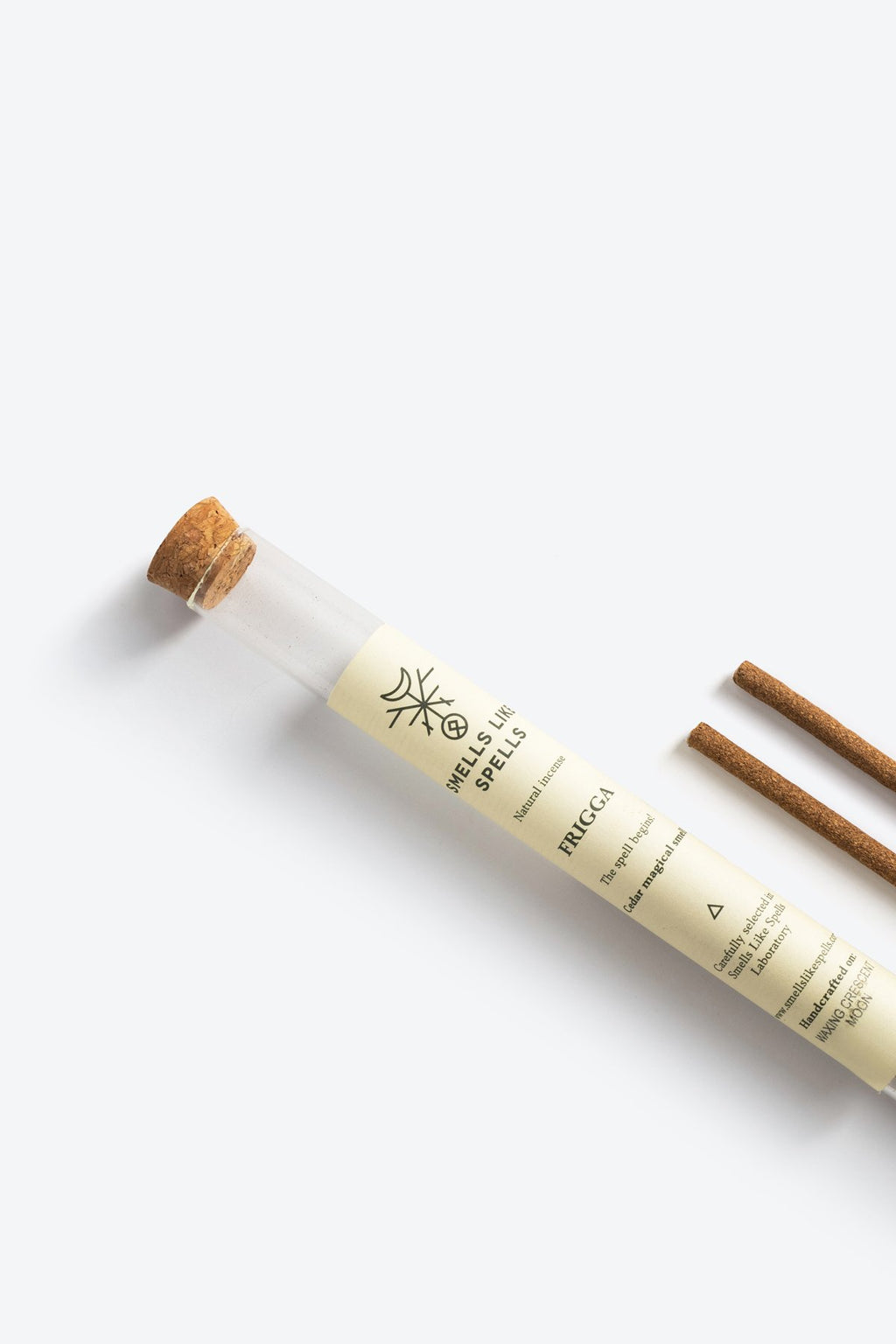 3. Close-up of Smells Like Spells Natural Incense FRIGGA packaging and cedar sticks