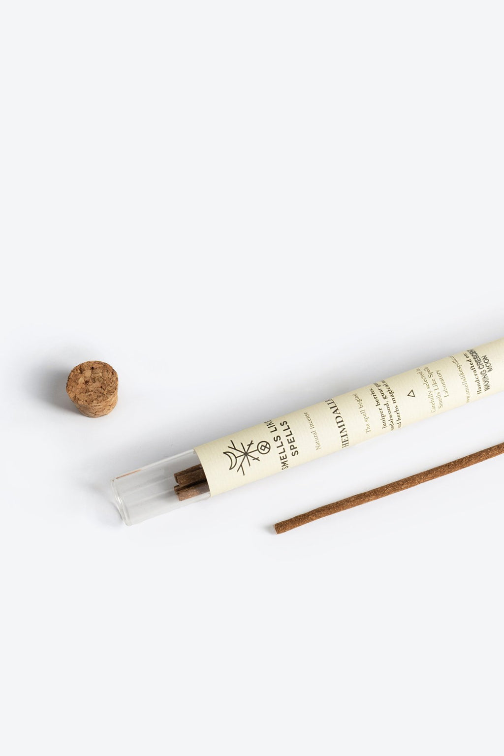 3. Close-up of Smells Like Spells Natural Incense HEIMDALLR in glass tube with cork, showcasing plant-based, eco-friendly packaging